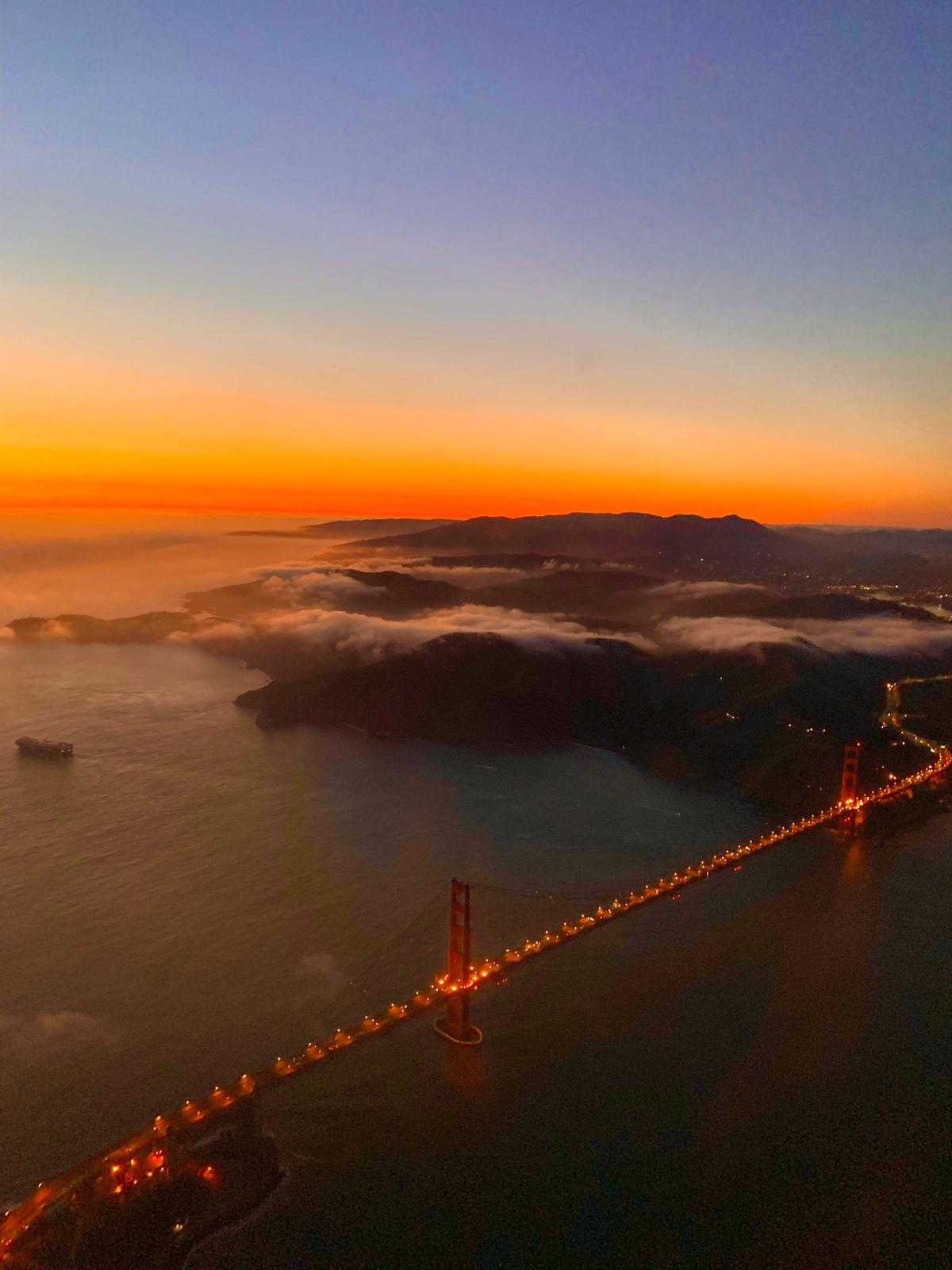 Golden Gate Bridge at sunset from the air